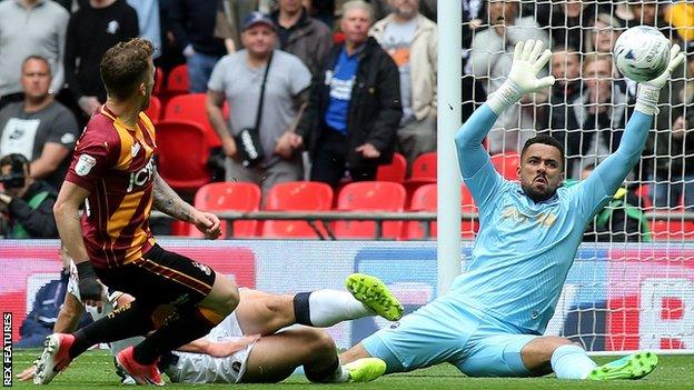 Jordan Archer saves from Billy Clarke