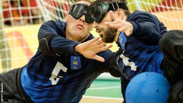 Jimmy Bjoerkstrand and Fatmir Seremeti block a ball from Brazil during their men's bronze-medal match of the Rio 2016 Paralympic Games.