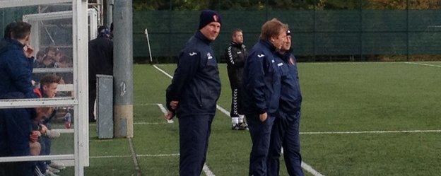 East Kilbride's management team - Billy Ogilvie and Gardner Speirs - chat on the sidelines