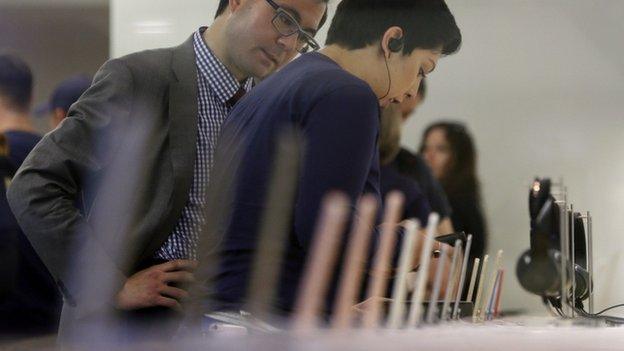 Customers in Apple store