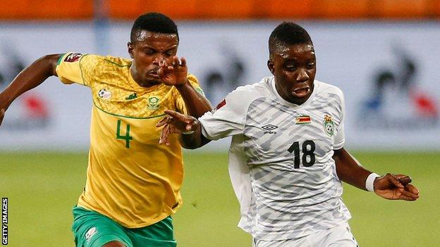 South Africa's Teboho Mokoena and Zimbabwe's Marvelous Nakamba battle for the ball