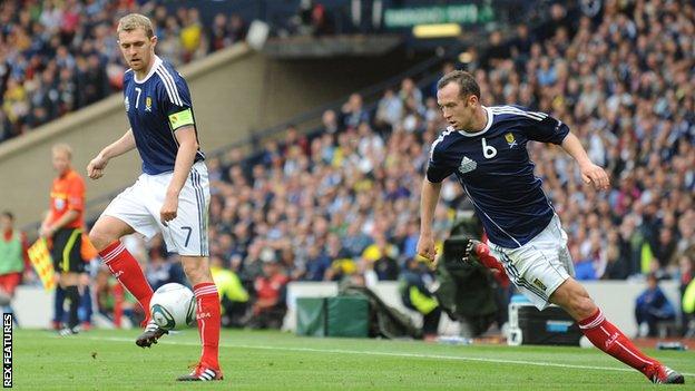 Charlie Adam and Darren Fletcher play for Scotland