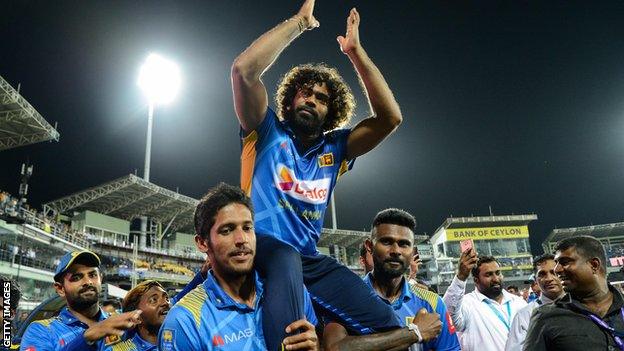 Sri Lanka's Lasith Malinga is carried by team-mates after his final ODI