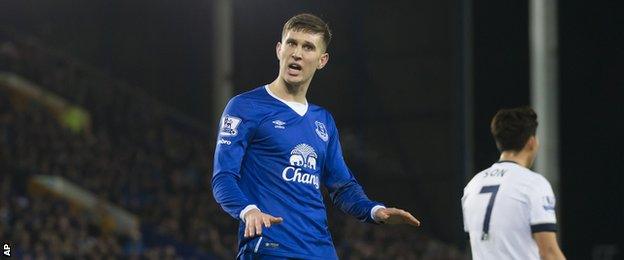 John Stones gestures to supporters at Goodison Park on Sunday