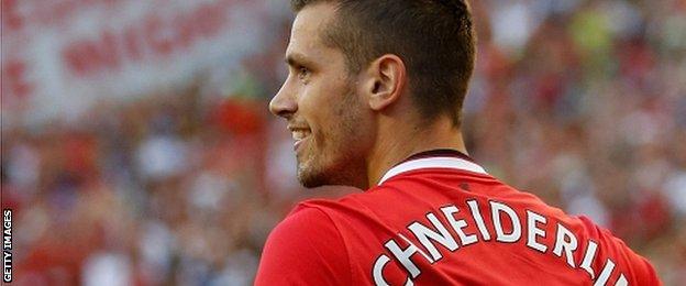 Morgan Schneiderlin smiles after marking his debut with the winning goal against Club America