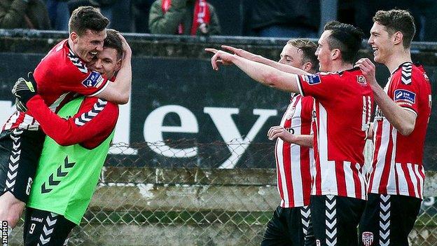 A delighted Harry Monaghan celebrates his goal against Rovers with Derry team-mates