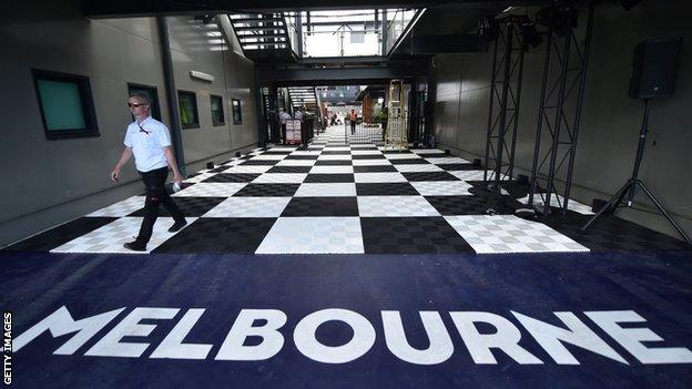 A man walking down a corridor at Albert Park in Melbourne