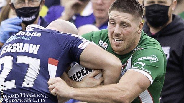 Tom Lineham (right) in action for Warrington