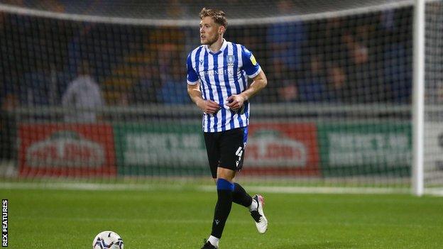 Lewis Gibson playing for Sheffield Wednesday