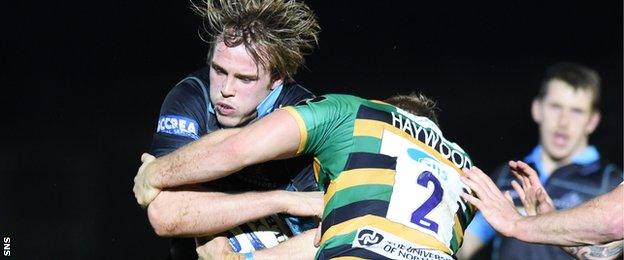 Jonny Gray is tackled by Mikey Haywood