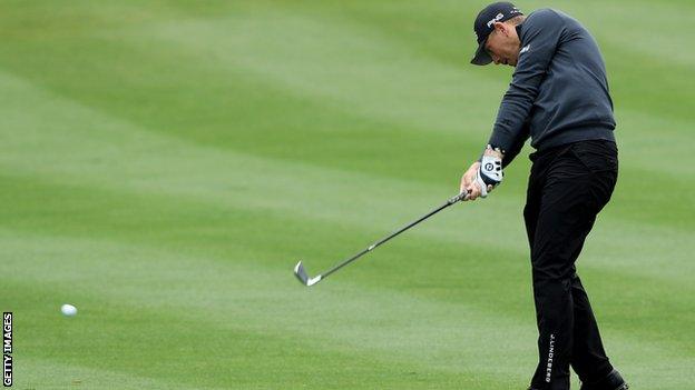 Matt Wallace plays his second shot on the second hole during the final round of the Players Championship in Sawgrass