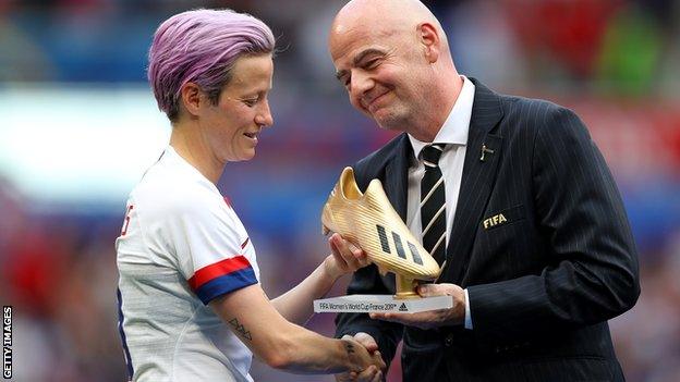 Megan Rapinoe and Gianni Infantino