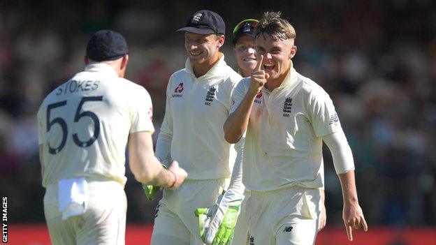 England bowler Sam Curran (right) points at Ben Stokes (left) after they combine to remove South Africa batsman Rassie van der Dussen on day two of the second Test