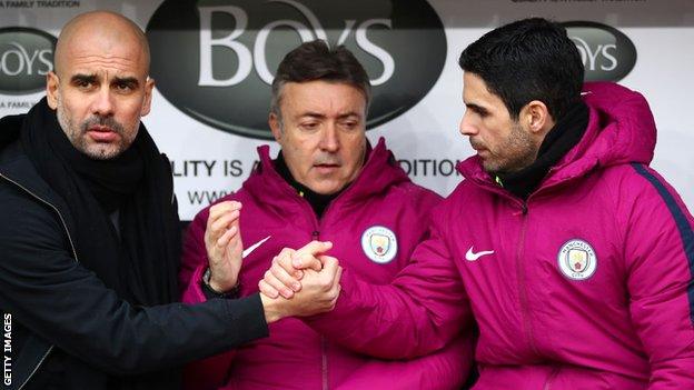 Pep Guardiola and Mikel Arteta shake hands