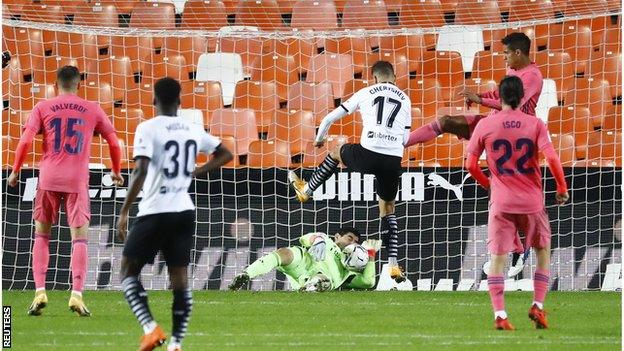 Valencia go 2-1 up against Real Madrid thanks to an own goal by Raphael Varane