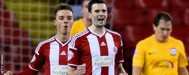 Jamie Murphy celebrates with Sheffield United