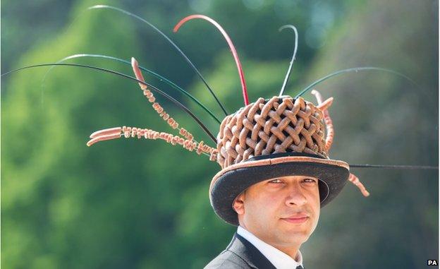 Yaseen Ali-Choudhrey wears a hat made out of sausages during Ladies Day, on day three of the 2015 Royal Ascot Meeting at Ascot Racecourse