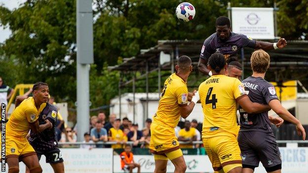 Omar Bogle scores Newport's goal against Sutton United