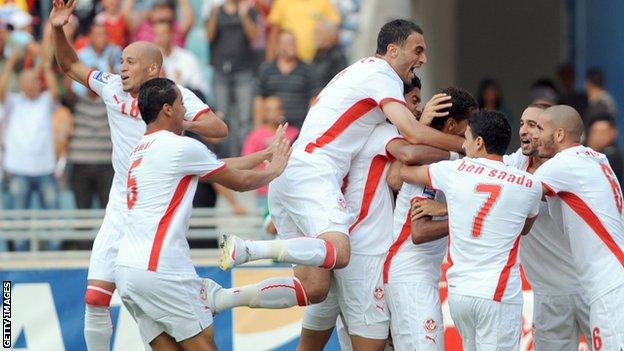 Tunisian players scoring a goal