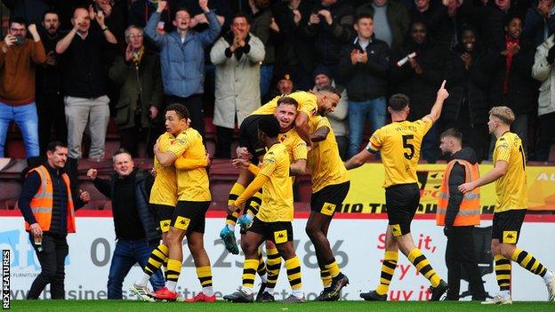 Alvechurch celebrate scoring in their FA Cup win over Cheltenham