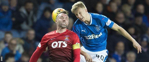 Kris Boyd and Ross McCrorie challenge for a header during Kilmarnock's draw with Rangers