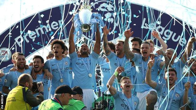 Manchester City's players celebrate winning the Premier League