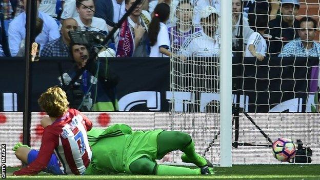 Antoine Griezmann scores for Atletico Madrid against Real Madrid