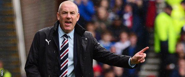 Mark Warburton makes a point to his Rangers players during their 2-1 win over Motherwell