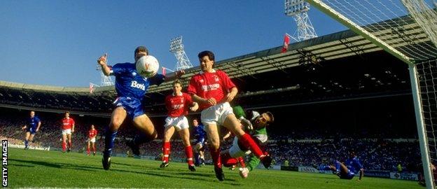 Nottingham Forest and Oldham players watch as Steve Sutton saves a shot and denies the Latics