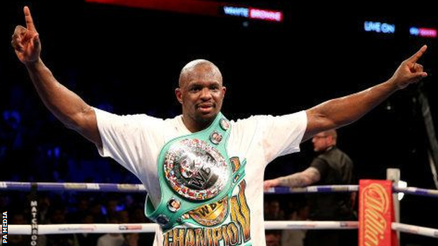 Dillian Whyte posing with the WBC interim world heavyweight belt