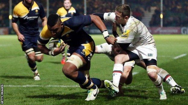 Christian Scotland-Williamson breaks free of a tackle by Leicester Tigers' David Mele