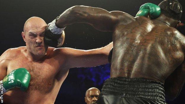 Tyson Fury lands a jab on Deontay Wilder