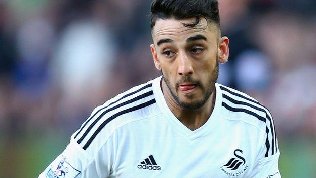 Wales and Swansea left-back Neil Taylor