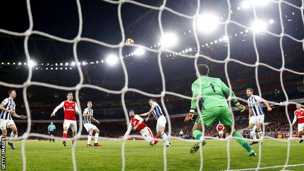 Olivier Giroud scores his fourth top flight goal of the season with his effort against West Brom