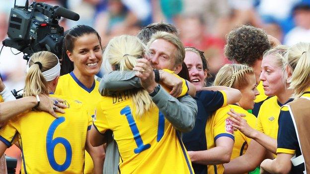 Coach Thomas Dennerby celebrates with his Swedish side at the 2011 Women's World Cup