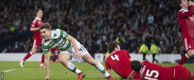 James Forrest wheels away in celebration after scoring