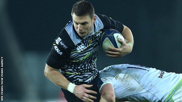 Ospreys fly-half Dan Biggar is tackled by Saracens opposite number Owen Farrell