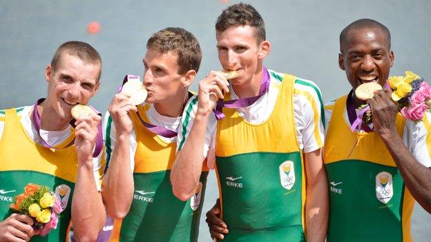 South Africa's 2012 rowing team on the podium with their gold medals