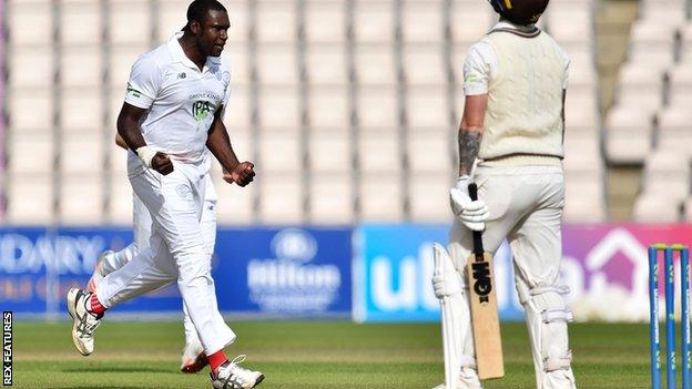 Keith Barker celebrates a wicket for Hampshire against Surrey