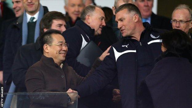 Vichai Srivaddhanaprabha and Nigel Pearson shake hands