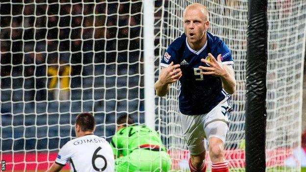 Steven Naismith celebrates scoring for Scotland