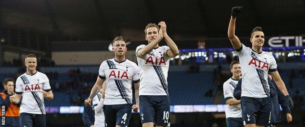 Tottenham players celebrate their victory at the Etihad Stadium