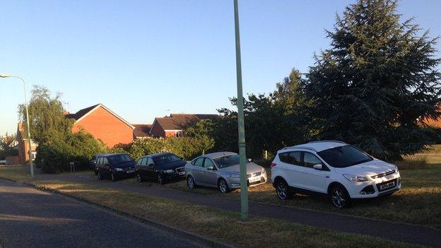 Cars blocking off green sites in Kesgrave