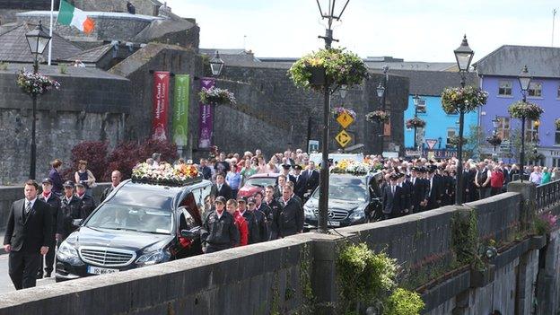 The funeral cortege of Larry and Martina Hayes