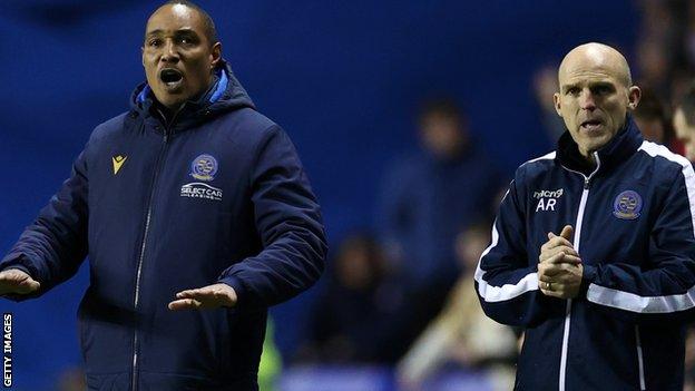 Reading interim manager Paul Ince alongside coach Alex Rae