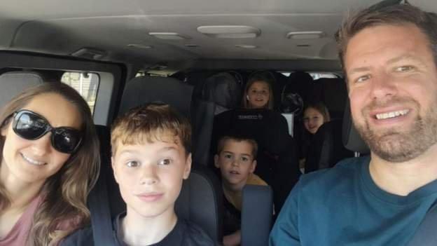 Jane Dennis and her family in their van on the way to France