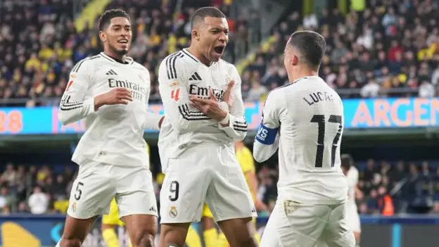 Mbappe double returns Real Madrid to La Liga summit