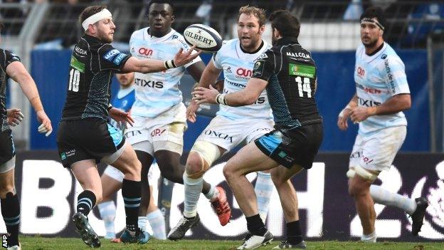 Glasgow fly-half Finn Russell juggles the ball against Racing 92