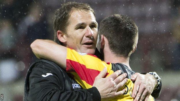 Partick Thistle's Alan Archibald and Kris Doolan embrace