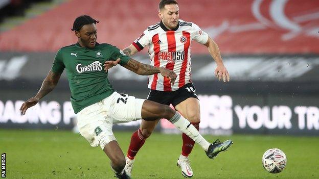 Jerome Opoku in action for Plymouth Argyle against Sheffield United